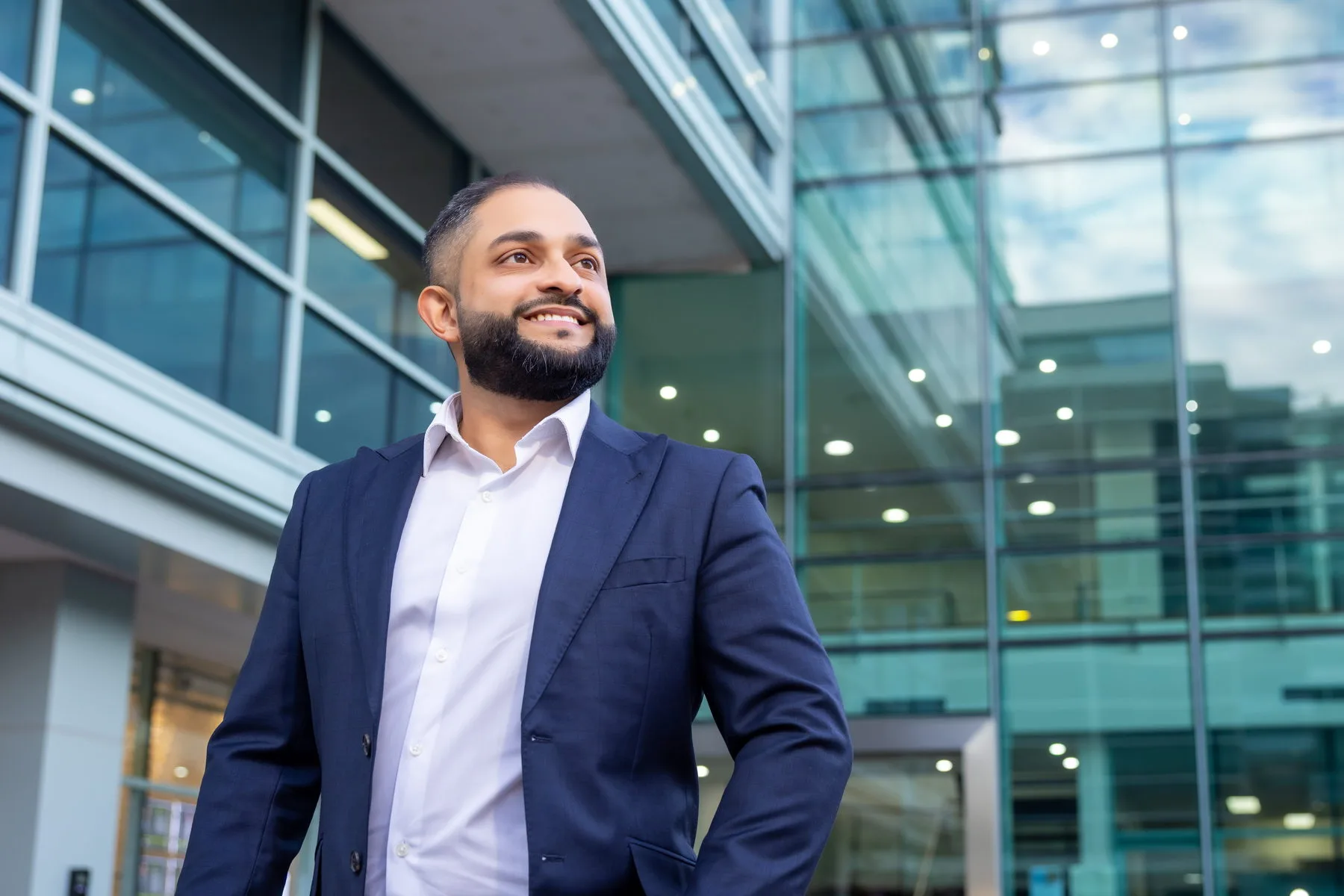 Manraj Singh of SMA Business Advisory outside a commercial office building in Sydney